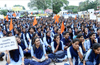Agitators jump off barricades during ABVP protest against  state budget
